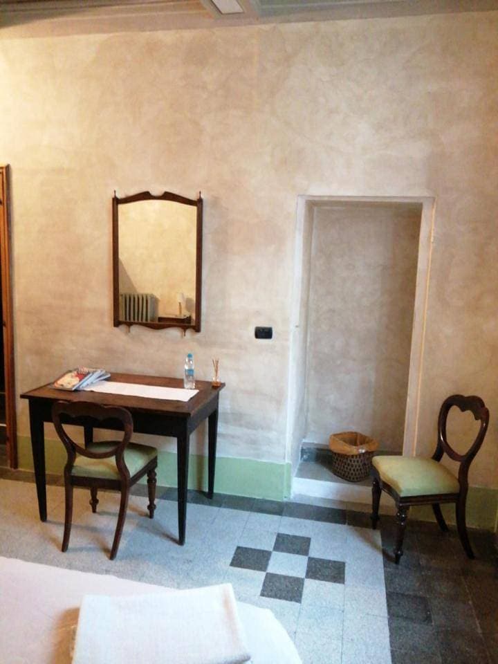 Foto 7 von 12: Triple Room with Private Bathroom