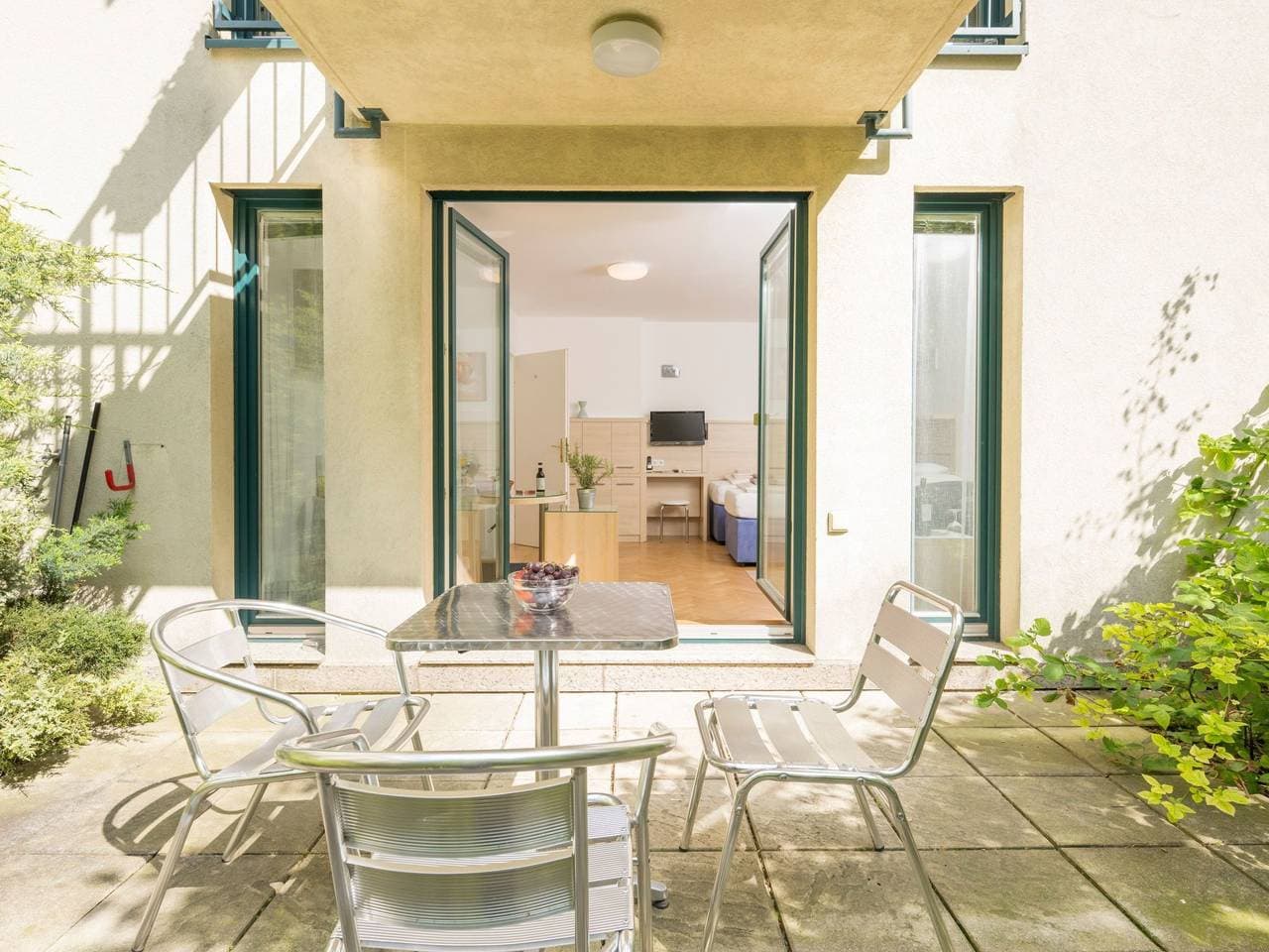 Foto 10 von 17: Studioappartement mit kleinem Garten und Terrasse