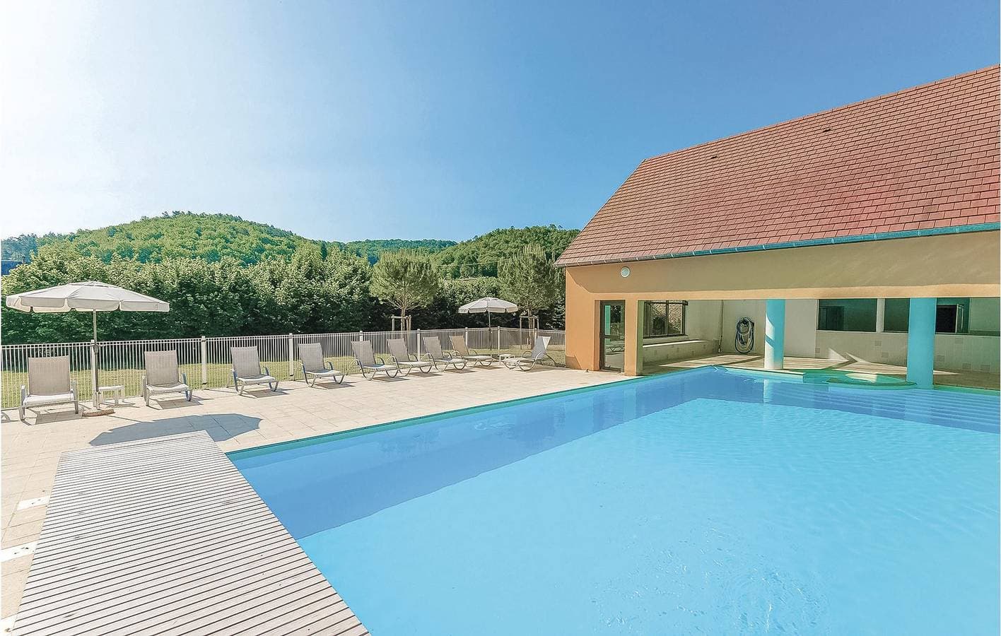 Foto 3 von 16: Terrassenwohnung mit Pool, Parkplatz & WiFi