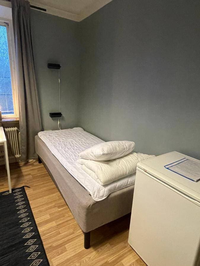Foto 2 von 7: Standard Double Room with Shared Bathroom