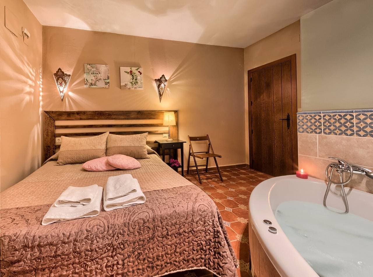 Foto 3 von 24: Ferienhaus 'Los Placeres Del Paladin' mit Bergblick, privater Terrasse und Klimaanlage