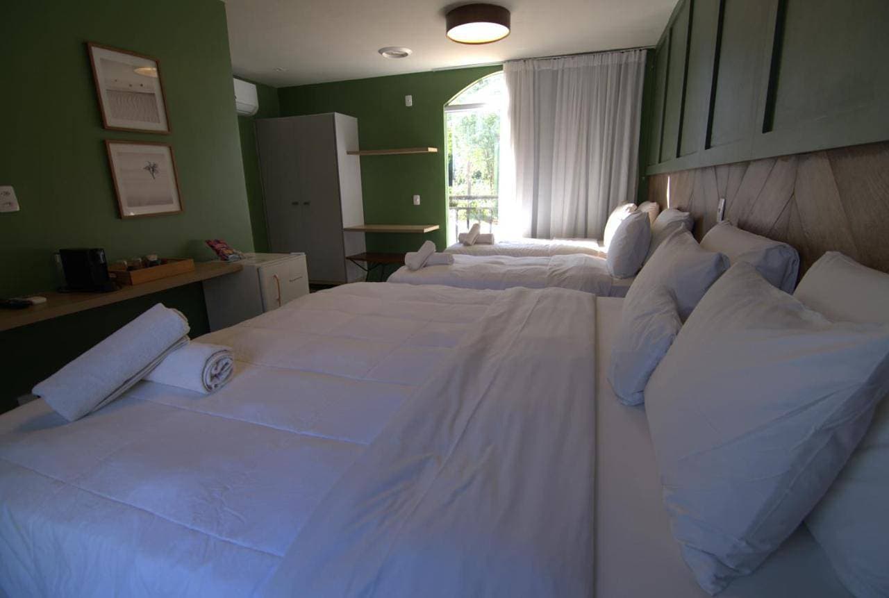 Foto 11 von 22: Triple Room with Garden View