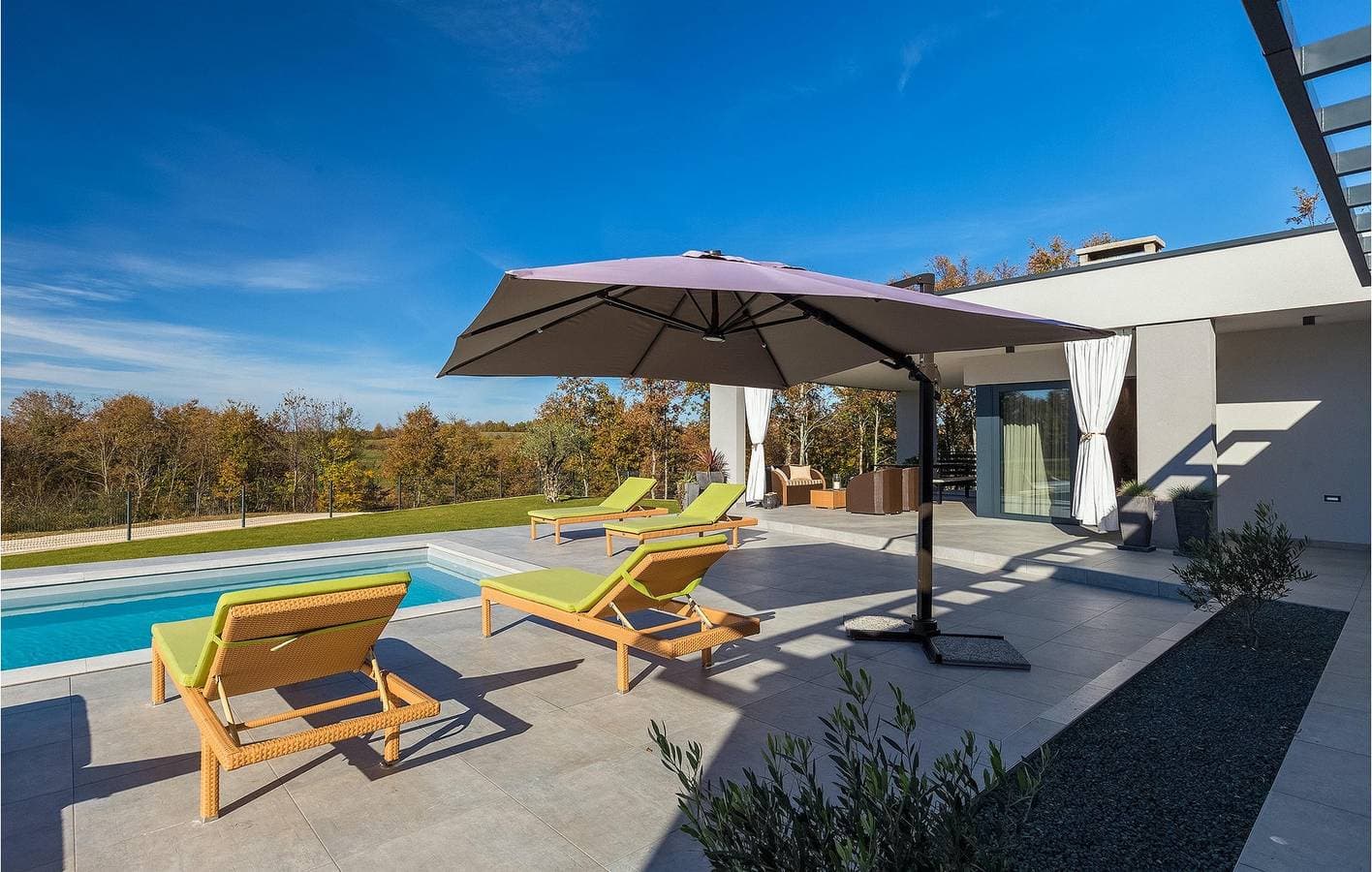 Foto 11 von 61: Geräumige 2-Zimmer-Wohnung mit Pool, WLAN, Klimaanlage und Parkplatz
