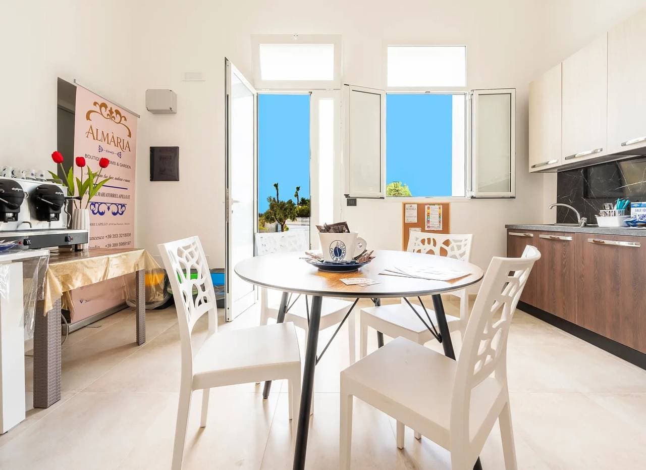 Foto 5 von 57: Zimmer "Aria - Dreibettzimmer" mit Gemeinschaftsgarten, WLAN und Klimaanlage