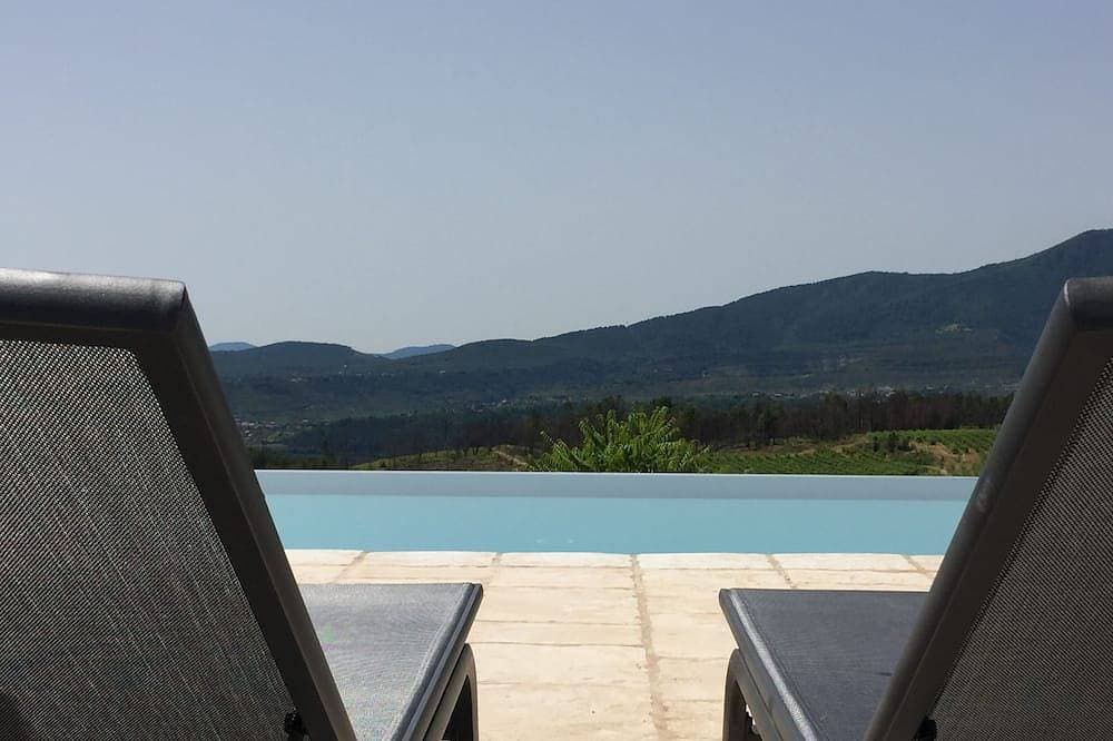 Foto 7 von 8: Mas De Vignal Gite. Cozy cottage with terrace and infinity pool