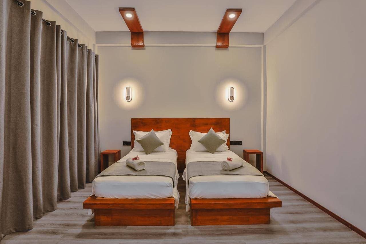 Foto 6 von 12: Standard Twin Room with Garden View