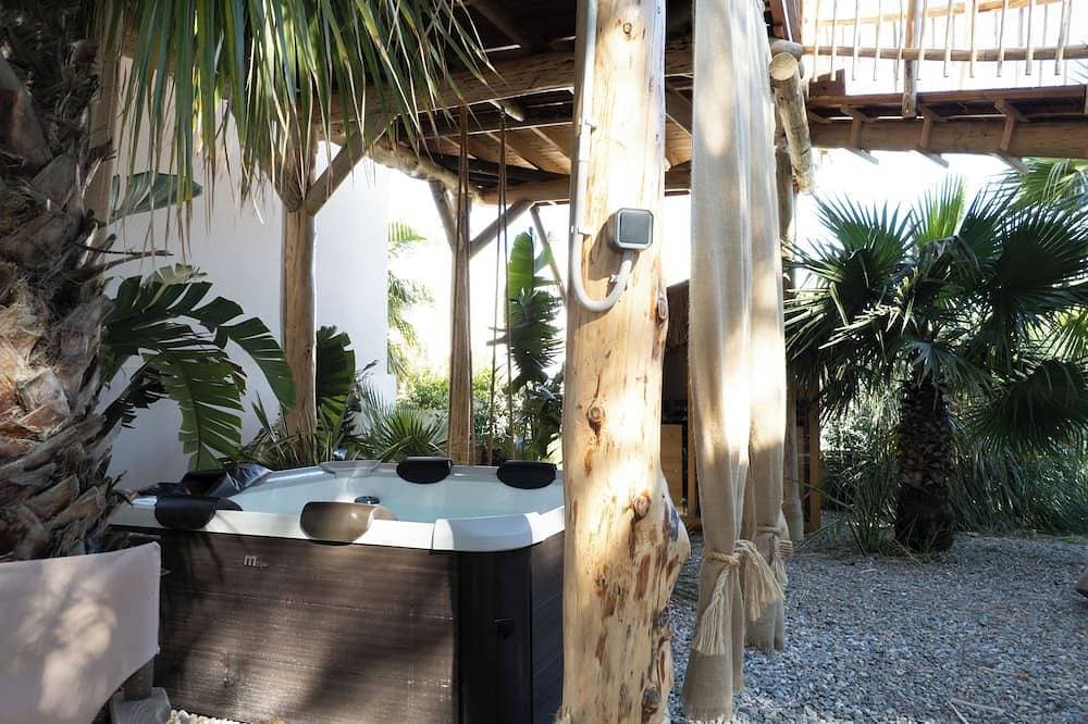 Foto 9 von 27: Zen Tree Suite with Jacuzzi | D Palm Premium Living