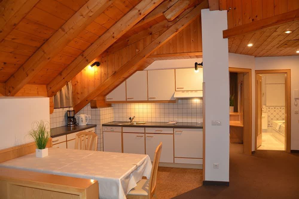 Foto 11 von 27: Gemütliche und geräumige Dachwohnung mit Balkon - Free WIFI