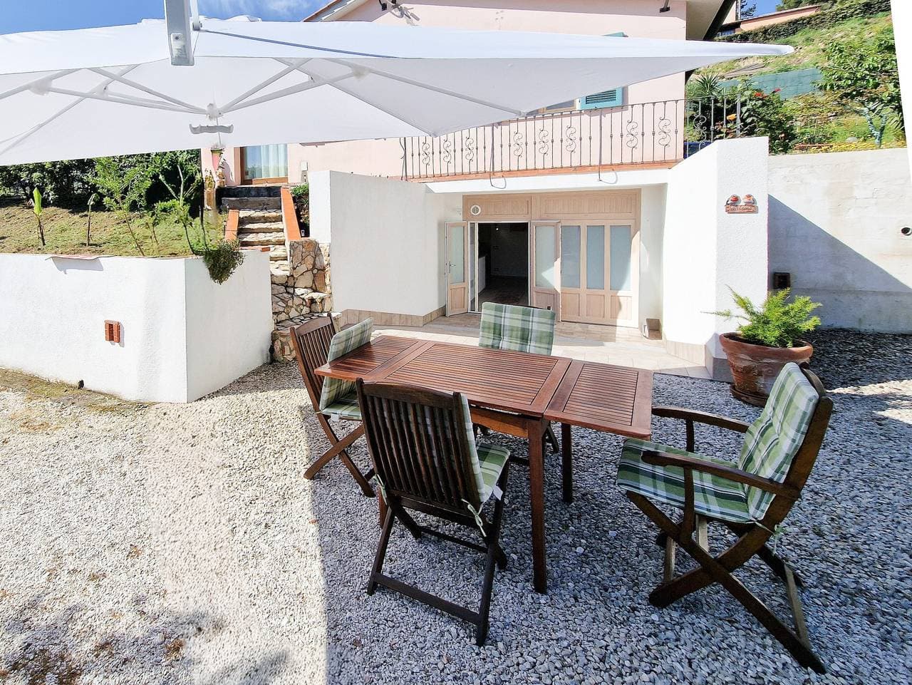 Foto 6 von 26: Ferienhaus 'Pettirossi' mit gemeinsamem Garten, WLAN und Klimaanlage