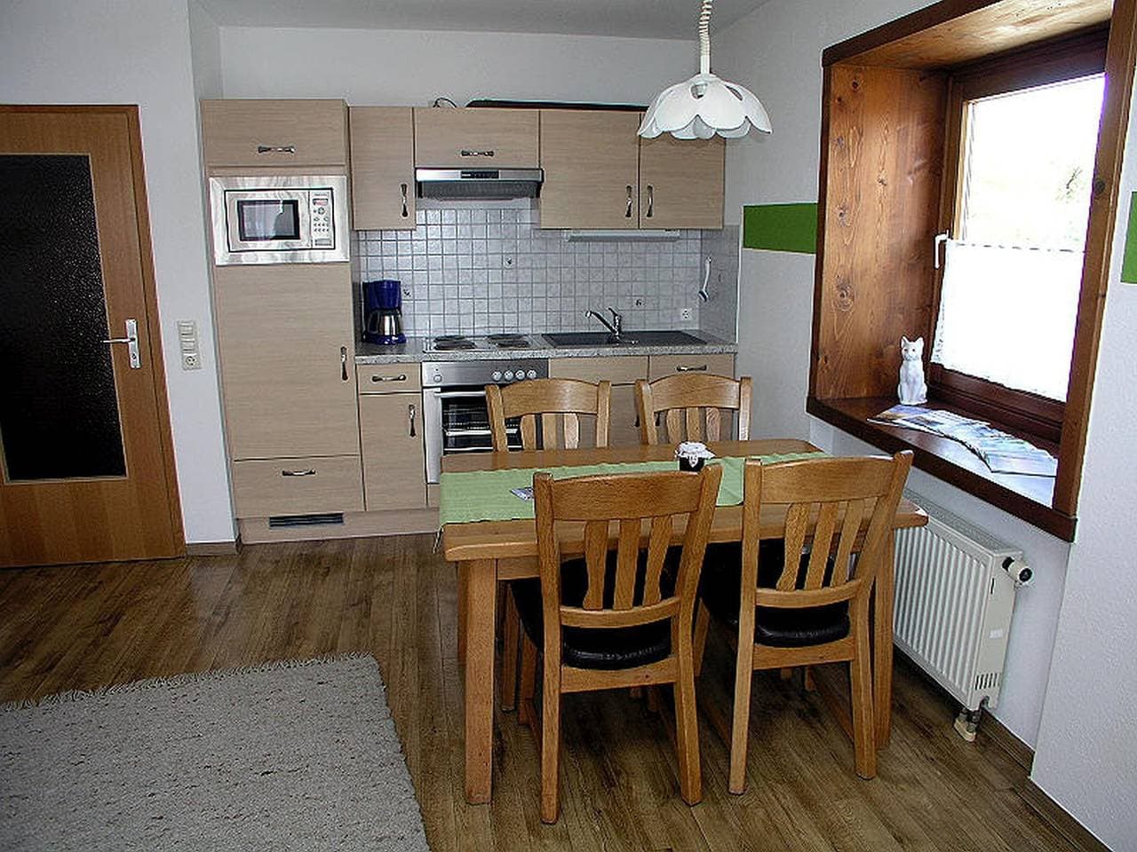 Foto 5 von 26: Ferienwohnung 1 mit privater Terrasse, Gemeinschaftsgarten und Wi-Fi