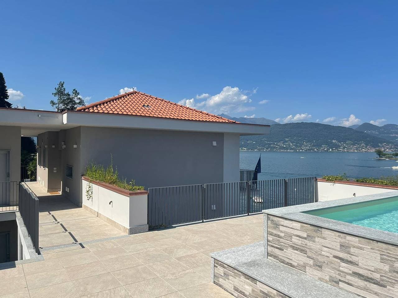 Foto 4 von 29: Isole apartment with pool and lake view in Baveno