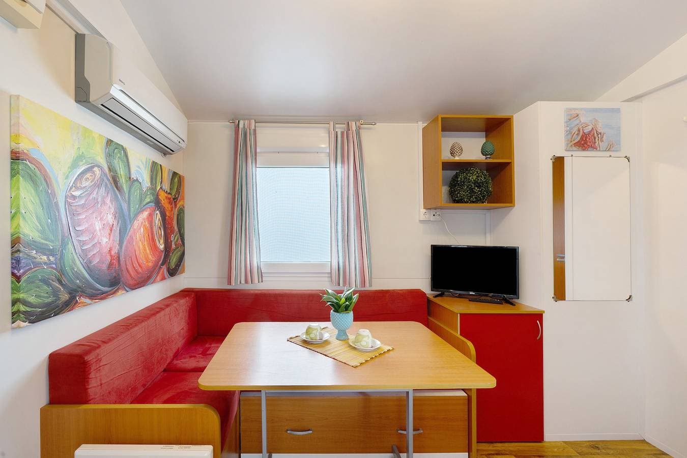Foto 9 von 41: Mobilheim 'Casa Mobile 12' mit Gemeinschaftsgarten und WLAN