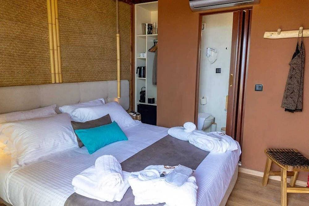Foto 2 von 28: Dream Tree Suite with Jacuzzi | D Palm Premium Living