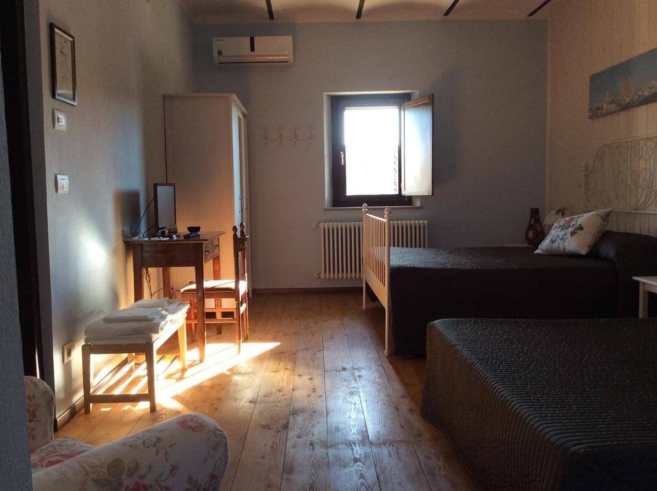 Foto 6 von 9: Quadruple Room