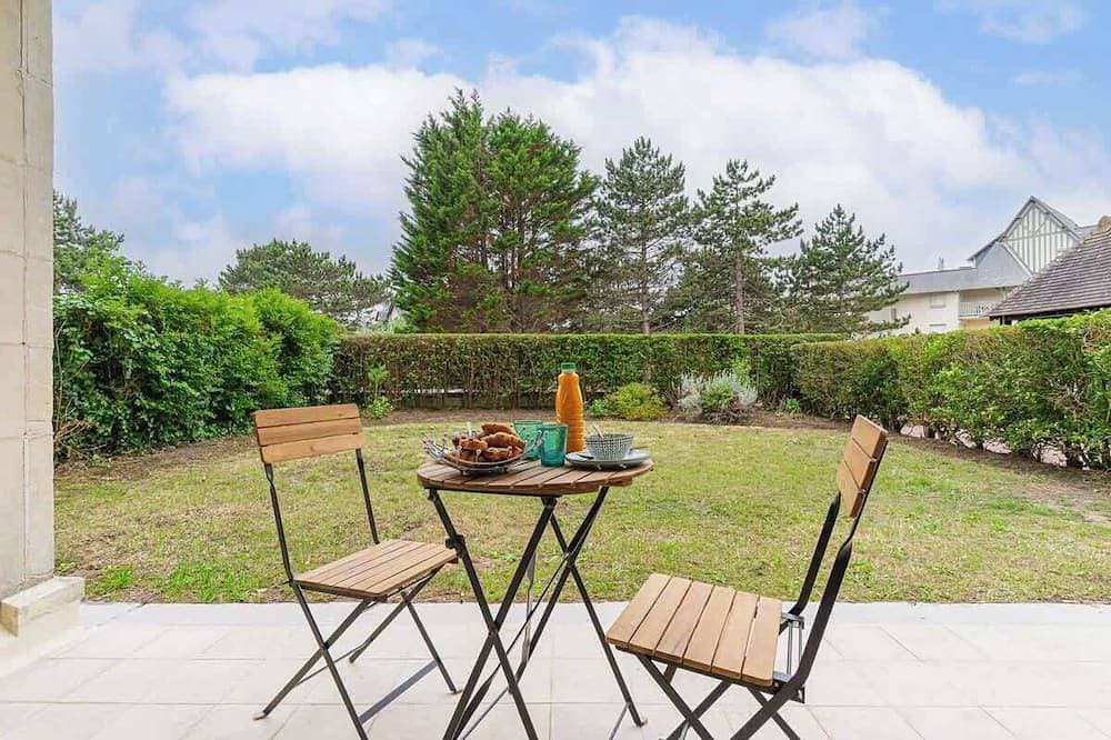Foto 12 von 12: Appartement au bord de la mer avec Jardin