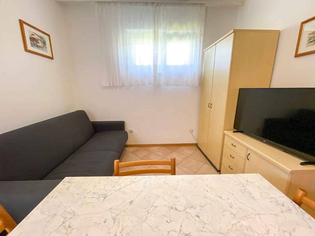 Foto 8 von 27: Ferienwohnung mit Terrasse und Klimaanlage