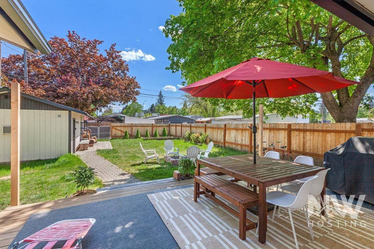 Cozy Downtown Bungalowire Pit Spacious Deck Fenced Yard Walk to Local Dining Bars Shops 1213 1