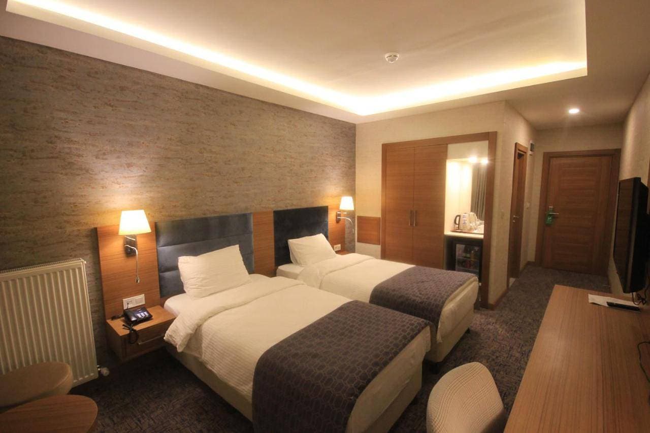 Foto 7 von 9: Deluxe Double Room with Two Double Beds