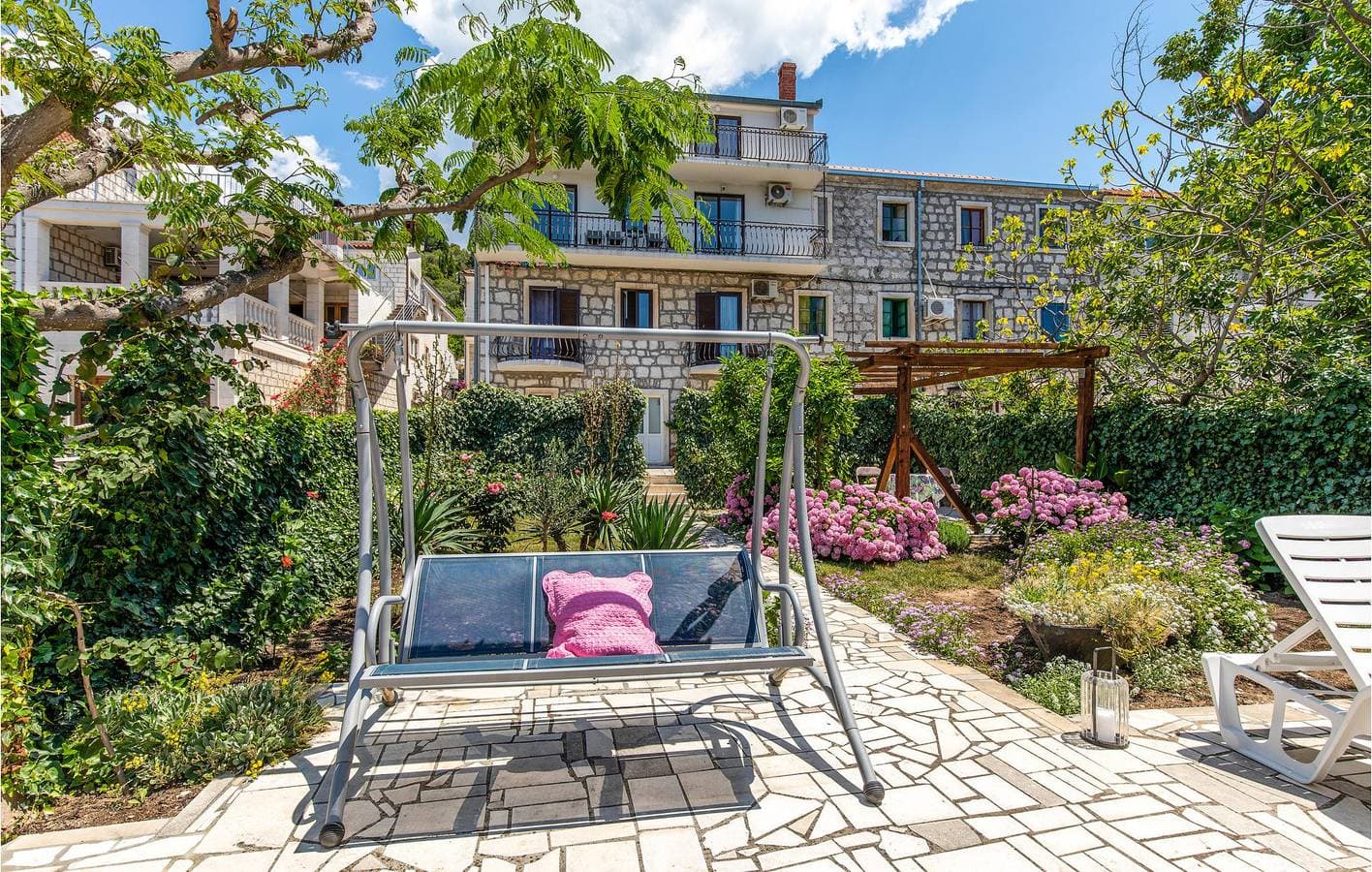 Foto 11 von 35: Gemütliche 300 m zum Strand: Klimatisierte Wohnung mit Terrasse und Parkplatz