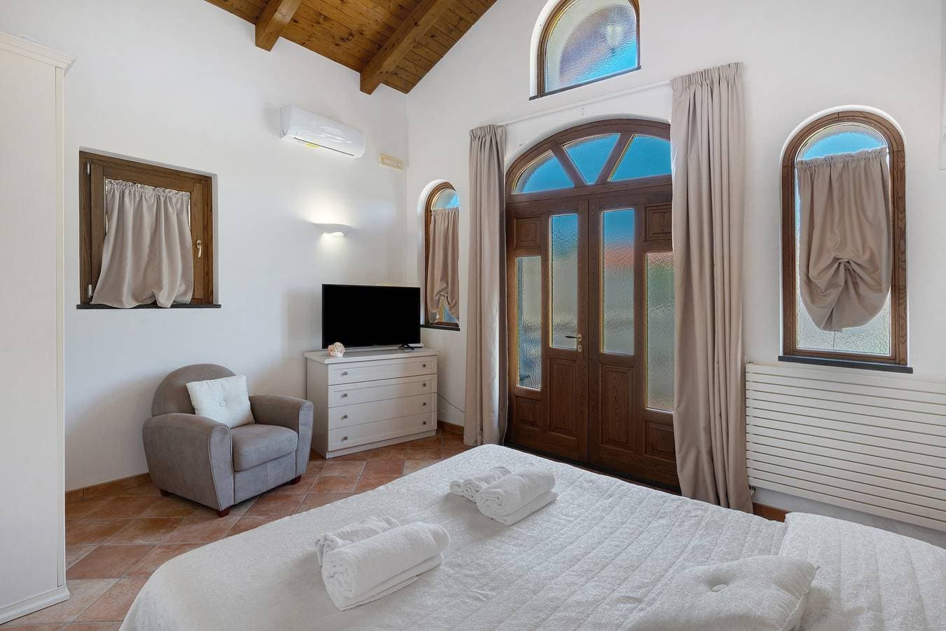 Foto 7 von 21: Ferienwohnung 'Delizioso Chalet Con Ampio Giardino' mit Bergblick, Wi-Fi und Klimaanlage