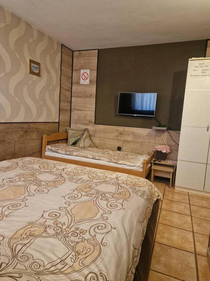 Foto 9 von 12: Basic Triple Room with Shared Bathroom