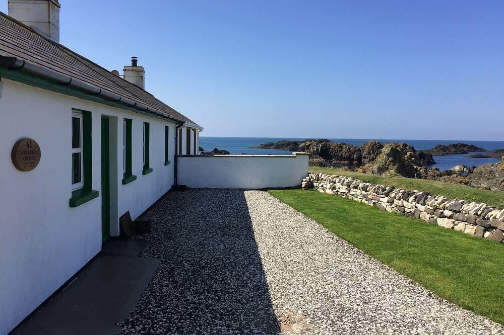 Foto 7 von 30: Schönes Ferienhaus direkt am Meer, weitläufige private Gärten, atemberaubender Meerblick.