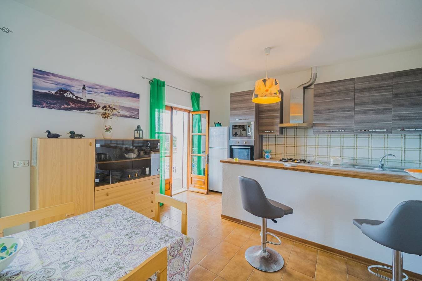 Foto 12 von 26: Ferienwohnung für 6 Personen mit Garten