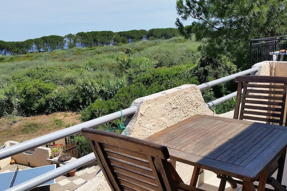 Foto 13 von 13: Mini Villa direct access to the sea 150 m, Courtyard, WIFI, Parking, closed garage