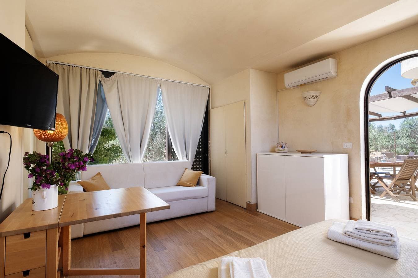 Foto 6 von 20: Appartement 'Residenze Uliveto - Residenza 10' mit Pool, privater Terrasse und Klimaanlage