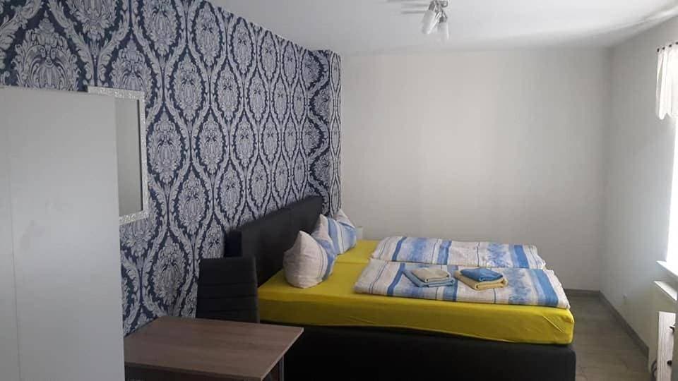 Foto 8 von 8: Triple Room with Bathroom