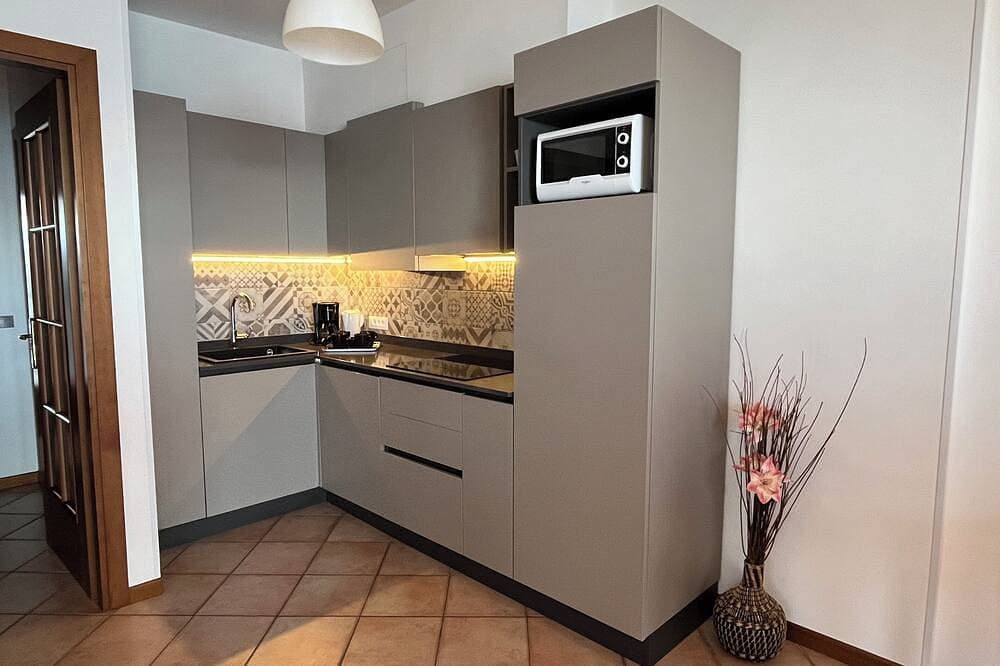 Foto 12 von 30: Casa Maffei Top Fewo 3, 2. Stock, Balkon mit traumhaftem Seeblick, Stellplatz