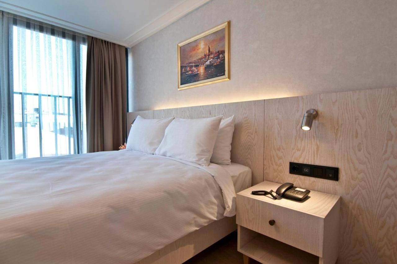 Foto 12 von 27: Deluxe Double Room with Side Sea View