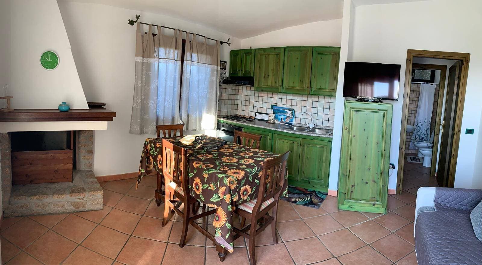 Foto 6 von 33: Ferienhaus „Vista Mozzafiato ad Isola Rossa“ mit Meerblick, privater Terrasse & Klimaanlage