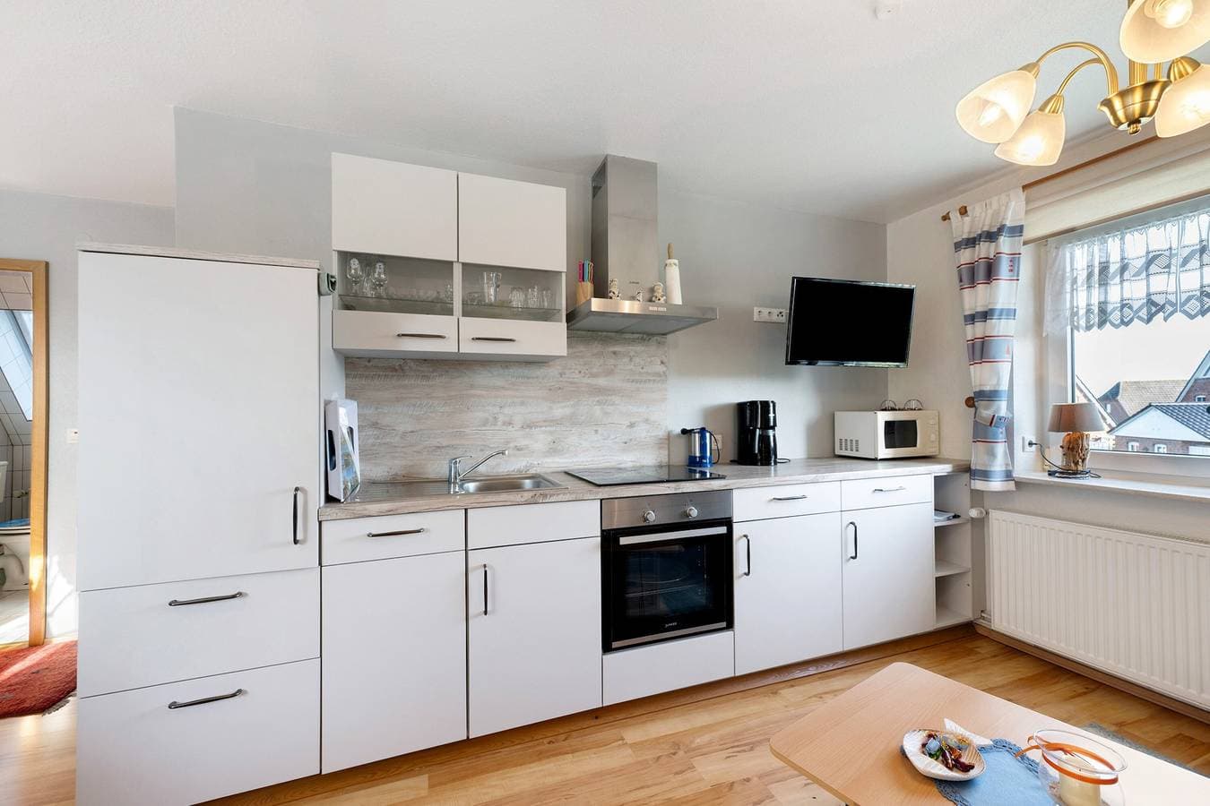 Foto 8 von 27: Ferienwohnung 'Haus Sünnschien' mit Gemeinschaftsterrasse, Gemeinschaftsgarten und WLAN
