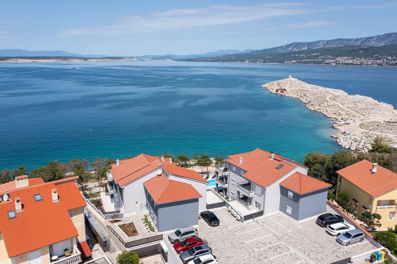 Foto 13 von 13: Luxusapartment Punta Silo - Studio, 30 m vom Meer, Meerblick, Swimmingpool, Außendusche, Smart-TV, Waschraum, privater Parkplatz