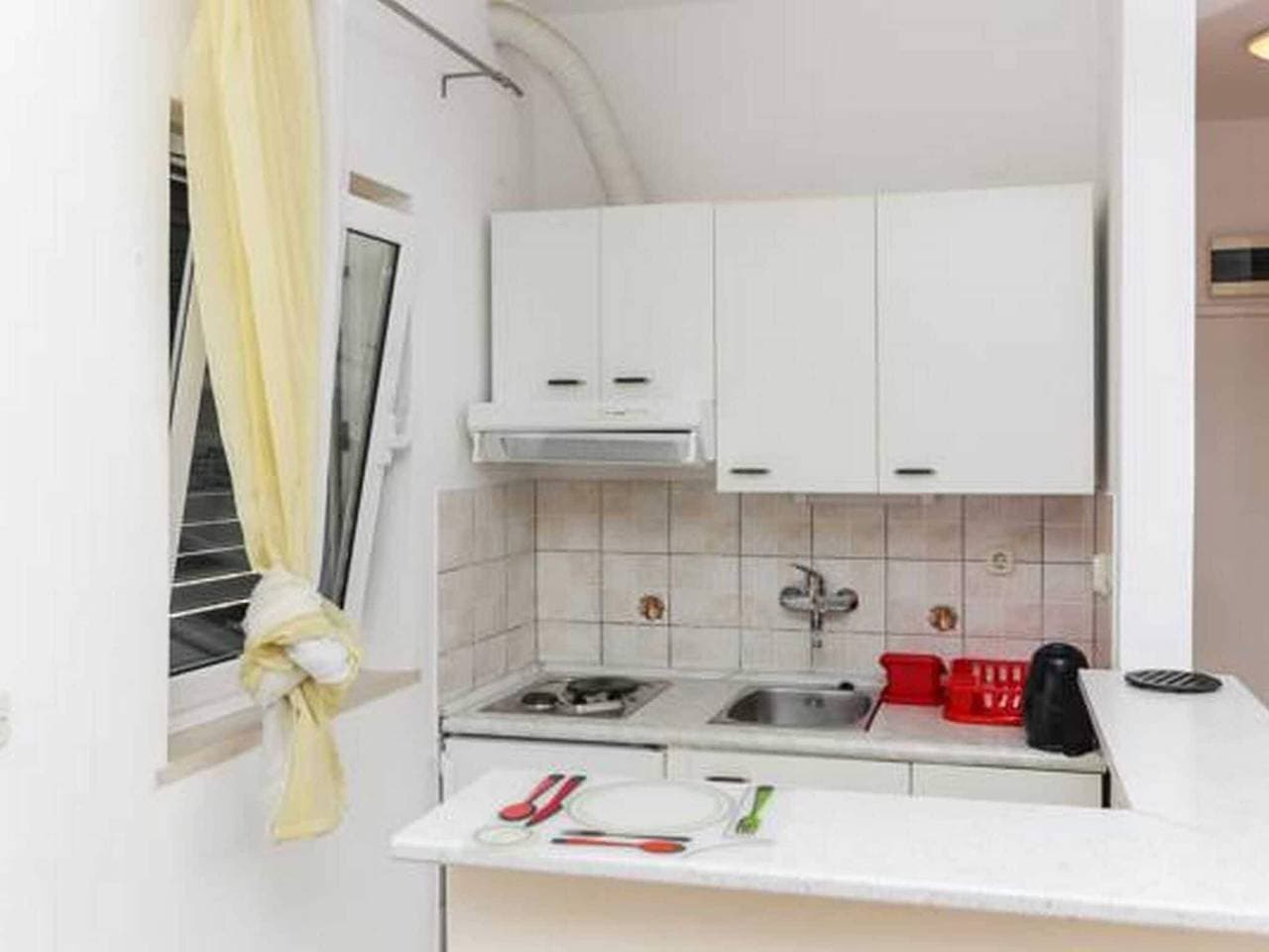 Foto 3 von 10: Apartments Posta - Comfort Studio with Balcony and Sea View - Apartman 1