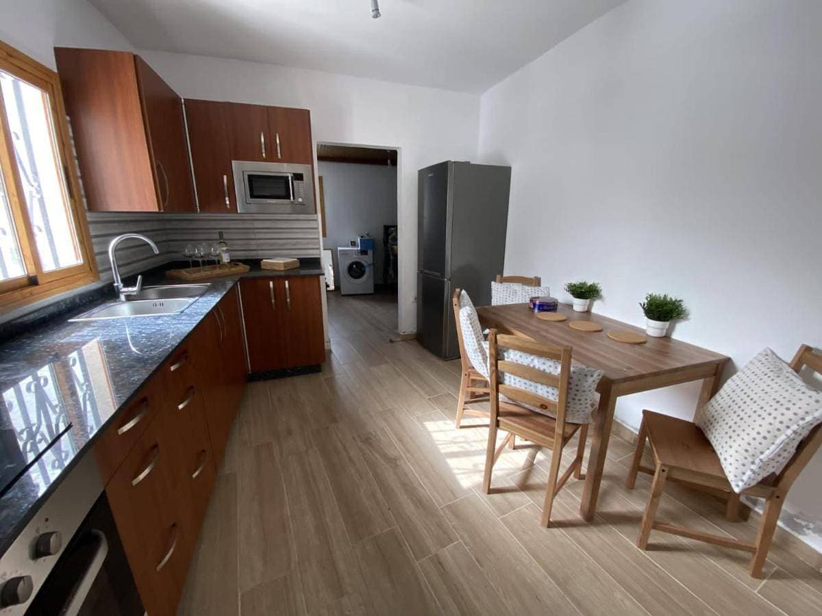 Foto 4 von 19: Three-Bedroom House