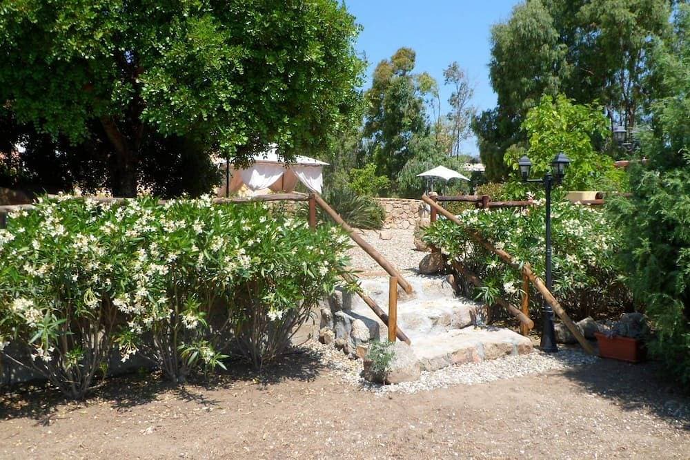 Foto 11 von 27: Casa Niperu in der Landschaft ein paar Meter von den Stränden von Cala Ginepro