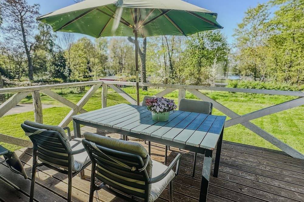 Top Lage am See - Charmantes Gelbes Bungalow mit Terrasse & Seeblick 1