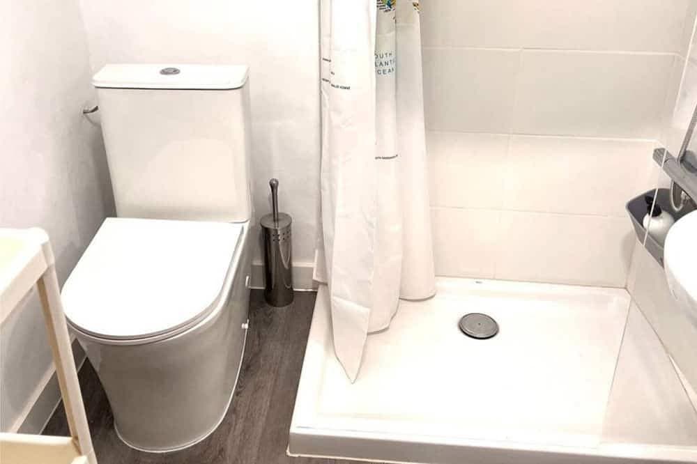 Foto 5 von 22: Cozy 2-bedroom apartment with WiFi, air-con and a  rooftop terrace with bbq.