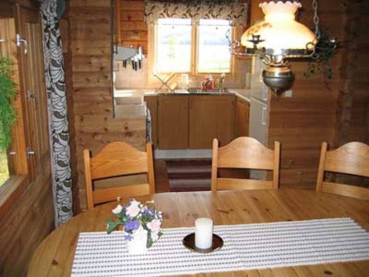 Foto 3 von 11: Gemütlich rustikales Ferienhaus mit Seeblick