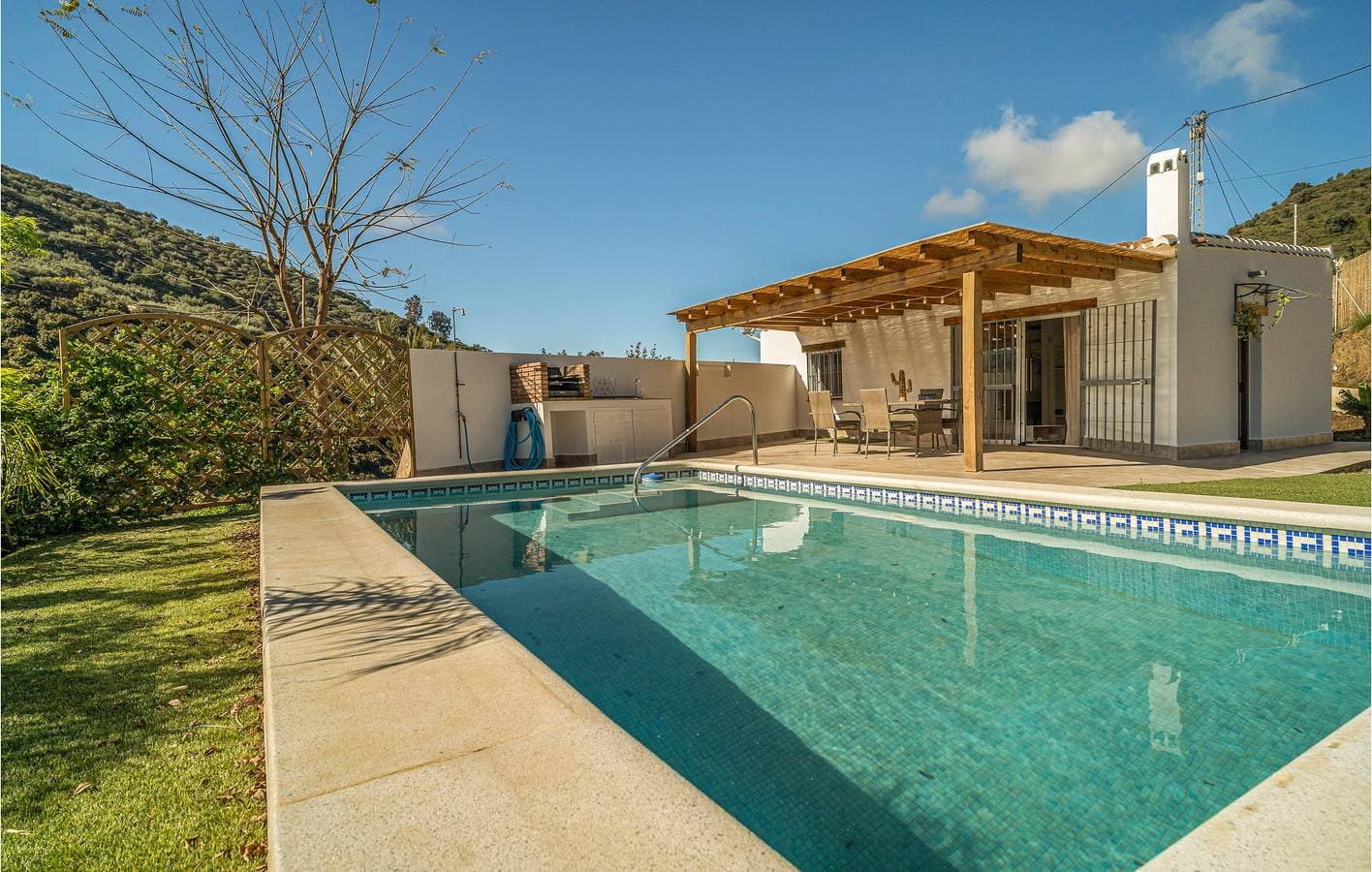 Foto 2 von 29: Poolside Haven: AC, Terrasse, Internet & Grill (800m von den Arenen, 1km zum Rio Seco)