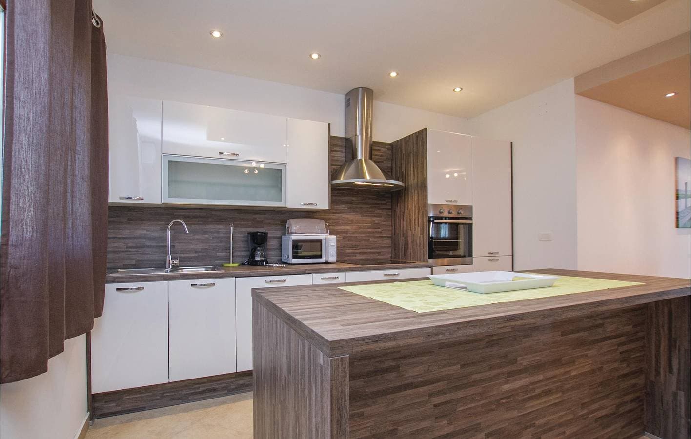 Foto 12 von 41: Nur 1 km vom Strand entfernt: Gemütliche Ferienwohnung mit Pool, WLAN und Terrasse