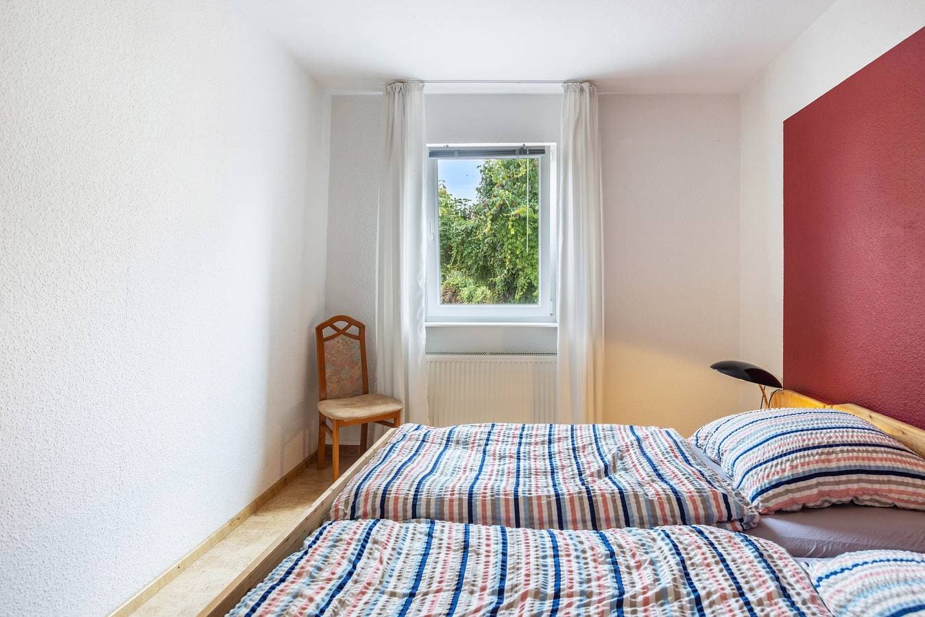 Foto 11 von 18: Ferienwohnung mit Gemeinschaftsgarten und WLAN