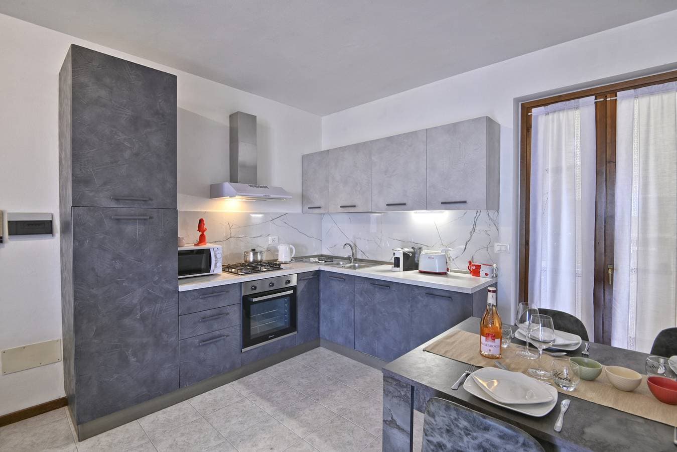 Foto 4 von 23: Appartamento Casa Ledio