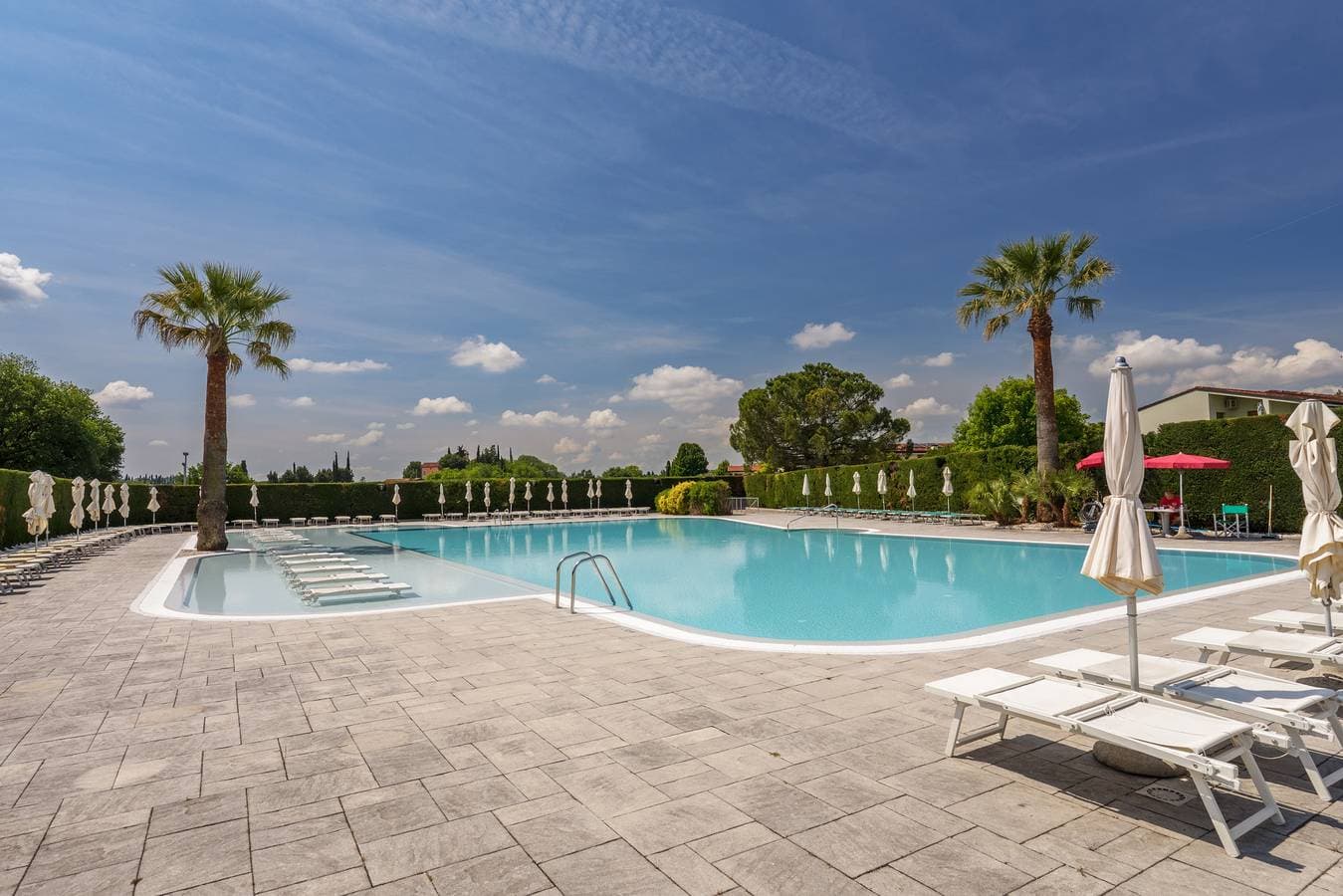 Foto 7 von 40: Regarda -Apple bilocale con piscina e parcheggio coperto