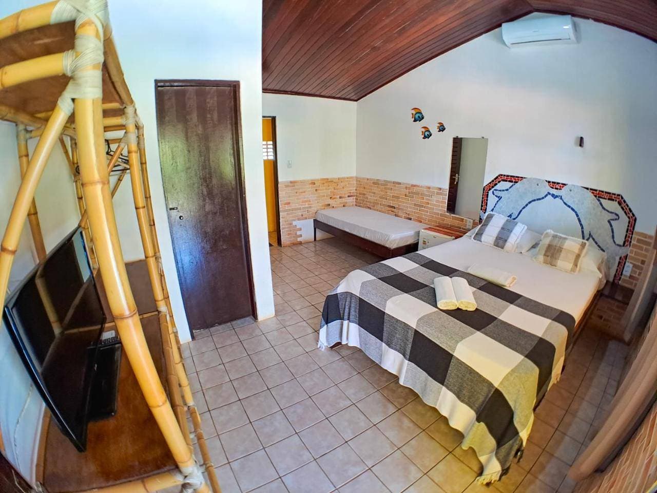 Foto 6 von 12: Triple Room with Pool View