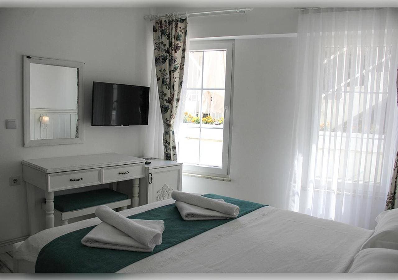 Foto 5 von 10: Deluxe Triple Room with Sea View