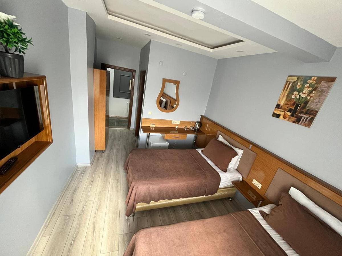 Foto 4 von 13: Basic Triple Room