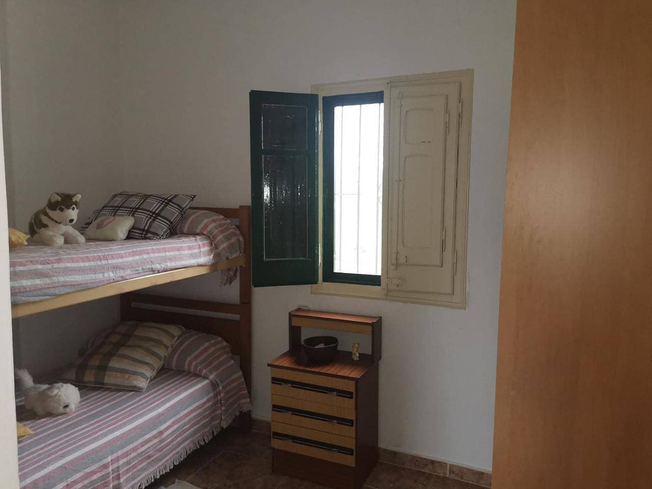 Foto 11 von 30: Three-Bedroom House
